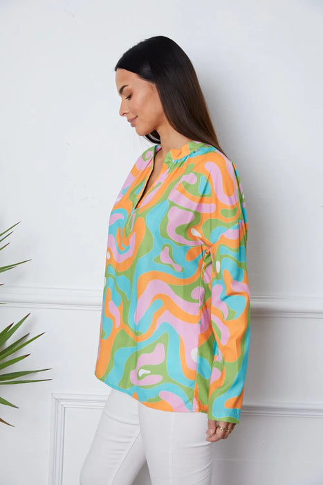 Printed Notched Long Sleeve Blouse - Byyde