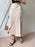 Asymmetric Wrap Midi Skirt with Fluted Hem - Byyde