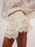 Lace Eyelet Ruffle Hem Shorts - Byyde