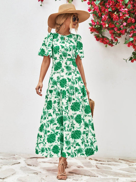 Floral Round Neck Tied Open Back Dress - Byyde