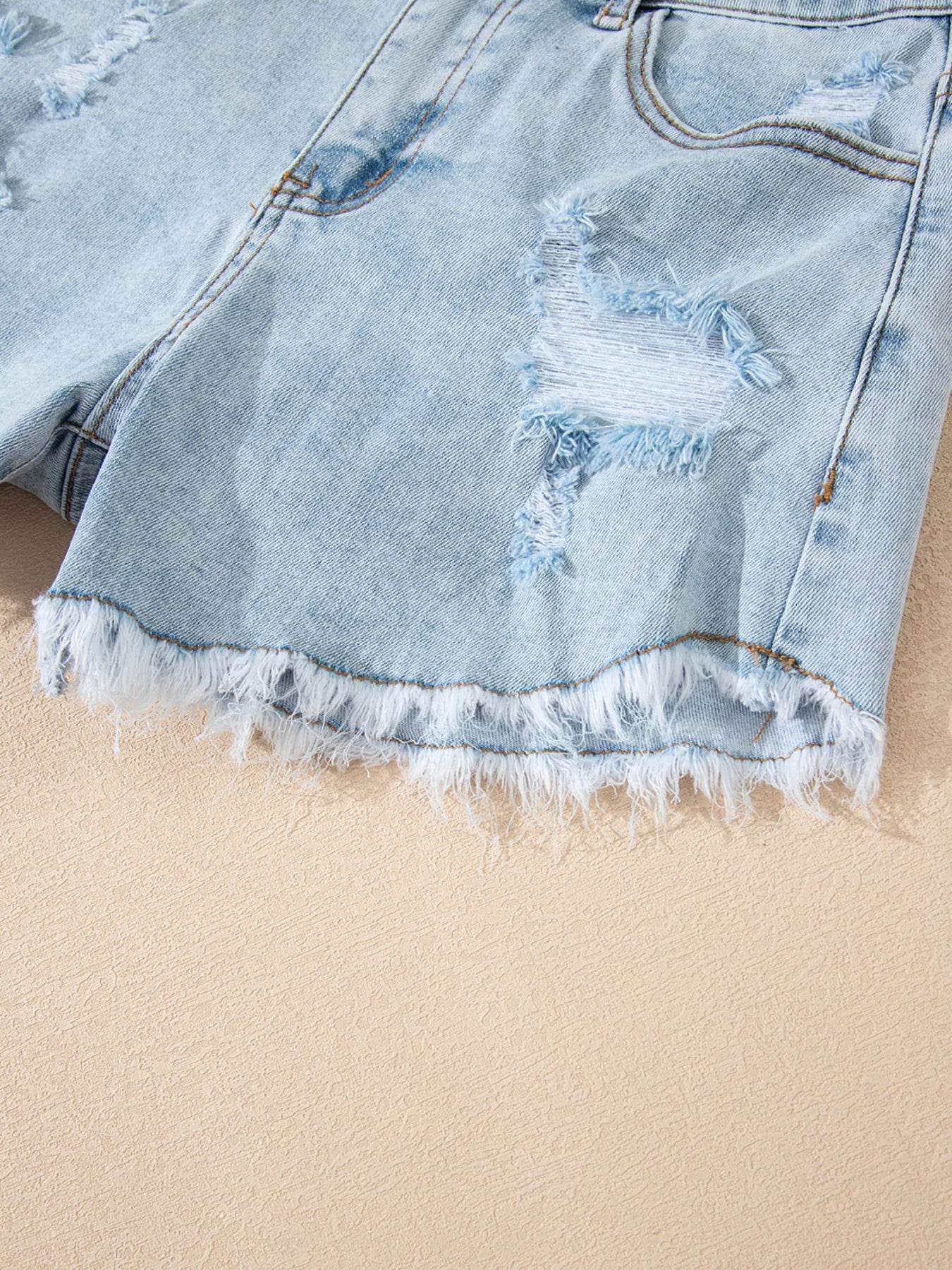 High Rise Distressed Raw Hem Denim Shorts - Byyde