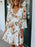 Floral V-Neck Three-Quarter Sleeve Mini Dress - Byyde