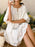 Eyelet Embroidered Tassel Tie Neck Dress - Byyde