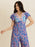 Printed V-Neck Wide Leg Jumpsuit - Byyde