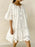 Eyelet Embroidered Tassel Tie Neck Dress - Byyde
